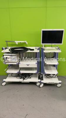 2 x Olympus Stack Trolleys with 1 x Olympus OEV261H Monitor (No Power Supply) Olympus Evis Lucera CV-260SL with Pigtail, Olympus Evis Lucera CLV-260SL Light Source and Stack Connecting Cable (All Power Up)