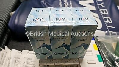 Mixed Lot Including 1 x DeVilbiss Pressure Care Mattress Cover, 1 x Unknown Cushion (See Photo), 1 x Cordless Bed Sensor Pad, 2 x Mattress Hoses, 1 x Smart Dual Recordable Voice with Mattress, 6 x Kynect Personal Lubricants *All Expired*, 1 x Box of Vicry - 4