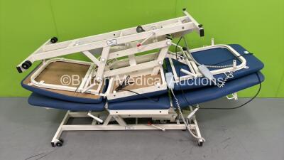 2 x Sidhil Electric Patient Examination Couches with Controllers (Both Power Up)