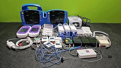 Mixed Lot Including 1 x GE Carescape V100 Dinamap, 1 x GE ProCare Auscultatory, 2 x Accu Chek Inform II Blood Glucose Meters (Both Missing Battery Covers), 1 x Drager Jaundice Meter with Docking Station (Powers Up), 1 x Organon TOF-Watch, 3 x Covidien Gen