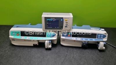 Mixed Lot Including 1 x Carefusion Alaris PK Syringe Pump and 1 x Carefusion Alaris CC SyrInge Pump (Both Draw Power, ) and 1 x Philips IntelliVue X2 Handheld Patient Monitor (Powers Up) Including ECG, SpO2, NBP, Press and Temp Options