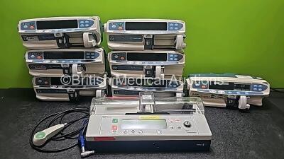 Job Lot Including 6 x CareFusion Alaris CC Guardrails Plus Syringe Pumps (5 x Draws Power and 1 x No Power), 1 x Asena CC Syringe Pump (Powers Up) and 1 x Alaris IVAC PCAM Syringe Pump with 1 x Trigger *SN 135067450 / 135067472 / 135067455 / 135289755 / 1