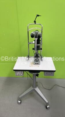 Eyco Slit Lamp with Binoculars, 2 x 10x, 2 x 18x Eyepieces and Chin Rest on Table (Powers Up - Not Sitting Correctly)