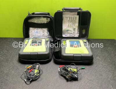 2 x Zoll AED PRO Defibrillators (Both Power Up) with 2 x 3 Lead ECG Leads, 2 x Batteries and 4 x Electrode Packs (2 x in Date, 2 x Expired)