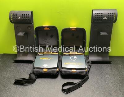 2 x Medtronic Lifepak CR Plus Defibrillators (Both Power Up) with 2 x Electrode Packs *Both in Date* in Carry Cases and 2 x Medtronic Mounting Brackets