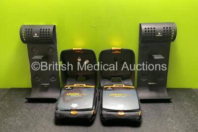 2 x Medtronic Lifepak CR Plus Defibrillators (Both Power Up) with 2 x Electrode Packs *Both Expired* in Carry Cases and 2 x Medtronic Mounting Brackets