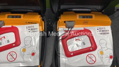 2 x Medtronic / Physio Control Lifepak CR Plus Defibrillators (Both Power Up) with 2 x Electrode Packs *Both Expired* in Carry Cases - 3