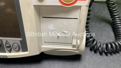 Philips Heartstart MRx Defibrillator with External Hard Paddles (Powers Up Temporarily Then Shuts Down) Including Pacer, ECG and Printer Options with Philips M3539A Module, Philips M3538A Battery, Philips M3725A Test Load, 3 Lead ECG Lead, Paddle Lead and - 5