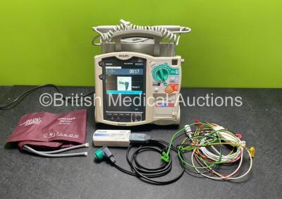 Philips Heartstart MRx Defibrillator with External Hard Paddles (Powers Up Temporarily Then Shuts Down) Including Pacer, NIBP, SpO2, Temp, BP1, BP2, ECG and Printer Options with Philips M3539A Module, Philips M3538A Battery, Philips M3725A Test Load, 3 Le