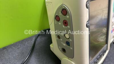 Philips Heartstart MRx Defibrillator with External Hard Paddles (Powers Up Temporarily Then Shuts Down) Including Pacer, NIBP, SpO2, Temp, BP1, BP2, ECG and Printer Options with Philips M3539A Module, Philips M3538A Battery, Philips M3725A Test Load, 3 Le - 3