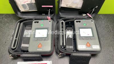 2 x Philips Heartstart FR3 Defibrillators (Both Power Up) In Carry Cases with 3 x Electrode Packs (All in Date) and 2 x Batteries (Install Before 2028 / 2028) *SN C18A-00370 / C18B-00315* - 2