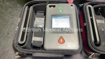 2 x Philips Heartstart FR3 Defibrillators (Both Power Up) In Carry Cases with 3 x Electrode Packs (All in Date) and 2 x Batteries (Install Before 2028 / 2028) *SN C18A-00370 / C18B-00315* - 3