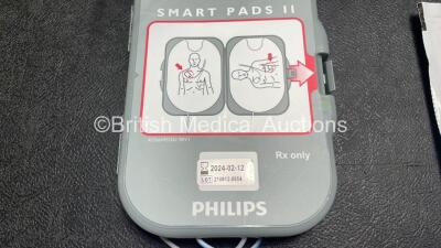 2 x Philips Heartstart FR3 Defibrillators (Both Power Up) In Carry Cases with 4 x Electrode Packs (All in Date) and 2 x Batteries (Install Before 2028 / 2028) *SN C18B-00119 / C18B-00083* - 6