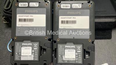 2 x Philips Heartstart FR3 Defibrillators (Both Power Up) In Carry Cases with 4 x Electrode Packs (All in Date) and 2 x Batteries (Install Before 2028 / 2028) *SN C18B-00119 / C18B-00083* - 8