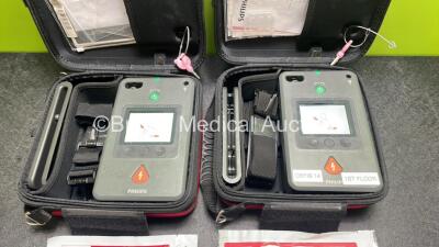 2 x Philips Heartstart FR3 Defibrillators (Both Power Up) In Carry Cases with 4 x Electrode Packs (All in Date) and 2 x Batteries (Install Before 2028 / 2027) *SN C18B-00119 / C18B-00083* - 2