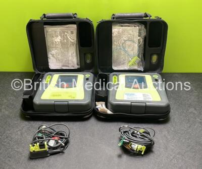 2 x Zoll AED PRO Defibrillators (Both Power Up) with 2 x 3 Lead ECG Leads, 2 x Batteries and 4 x Electrode Packs (2 x in Date, 2 x Expired)