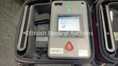 2 x Philips Heartstart FR3 Defibrillators (Both Power Up) In Carry Cases with 4 x Electrode Packs (2 in Date, 2 Expired) and 2 x Batteries (Install Before 2028 / 2028) *SN C18B-00285 / C18B-00084* - 3