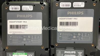 2 x Philips Heartstart FR3 Defibrillators (Both Power Up) In Carry Cases with 5 x Electrode Packs (4 in Date, 1 Expired) and 2 x Batteries (Install Before 2028 / 2028) *SN C18B-00096 / C19D-00199* - 10