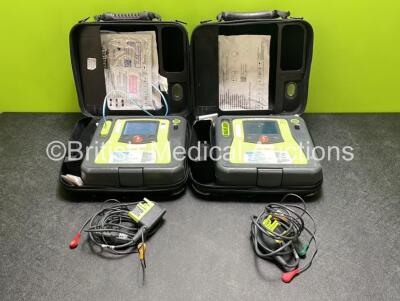 2 x Zoll AED PRO Defibrillators (Both Power Up) with 2 x 3 Lead ECG Leads, 2 x Batteries and 4 x Electrode Packs (2 x in Date, 2 x Expired)