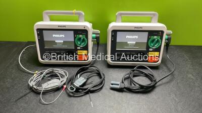 2 x Philips Efficia DFM100 Defibrillator *Mfd 2018 / 2018* with ECG and Printer Options, 2 x Batteries, 2 x Paddle Leads and 1 x 3 Lead ECG Lead (Both Power Up) *SN NA / CN32618885*