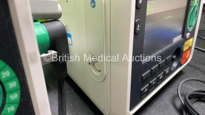 2 x Philips Efficia DFM100 Defibrillator *Mfd 2018 / 2018* with ECG and Printer Options, 2 x Batteries, 2 x Paddle Leads and 1 x 3 Lead ECG Lead (Both Power Up) *SN NA / CN32618885* - 6