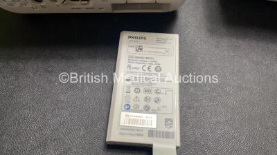 2 x Philips Efficia DFM100 Defibrillator *Mfd 2018 / 2020* with ECG and Printer Options, 2 x Batteries, 2 x Paddle Leads and 2 x 3 Lead ECG Leads (Both Power Up) *SN CN CN32639900 / CN32618883* - 6