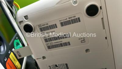 2 x Philips Efficia DFM100 Defibrillator *Mfd 2018 / 2020* with ECG and Printer Options, 2 x Batteries, 2 x Paddle Leads and 2 x 3 Lead ECG Leads (Both Power Up) *SN CN CN32639900 / CN32618883* - 8