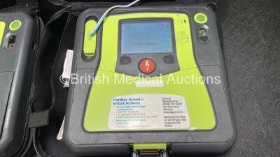 2 x Zoll AED PRO Defibrillators (Both Power Up) with 2 x 3 Lead ECG Leads, 2 x Batteries and 4 x Electrode Packs (3 x in Date, 1 x Expired) - 2