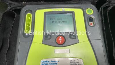 2 x Zoll AED PRO Defibrillators (Both Power Up) with 2 x 3 Lead ECG Leads, 2 x Batteries and 4 x Electrode Packs (3 x in Date, 1 x Expired) - 4