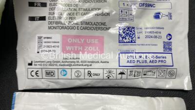 2 x Zoll AED PRO Defibrillators (Both Power Up) with 2 x 3 Lead ECG Leads, 2 x Batteries and 4 x Electrode Packs (3 x in Date, 1 x Expired) - 9