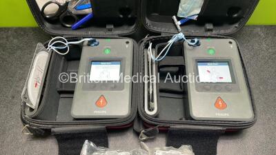 2 x Philips Heartstart FR3 Defibrillators (Both Power Up) In Carry Cases with 2 x Electrode Packs (Both in Date) and 4 x Batteries (Install Before 2026 / 2026 / 2022 / 2023) - 2