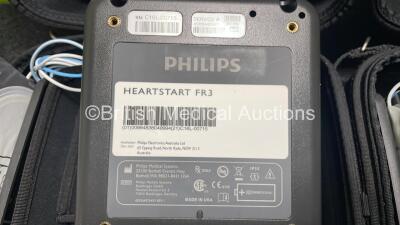 2 x Philips Heartstart FR3 Defibrillators (Both Power Up) In Carry Cases with 2 x Electrode Packs (Both in Date) and 4 x Batteries (Install Before 2026 / 2026 / 2022 / 2023) - 10