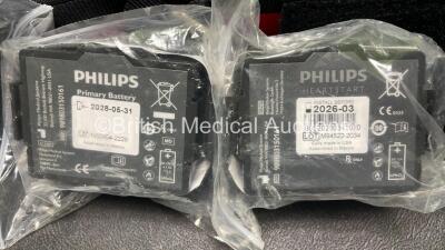 2 x Philips Heartstart FR3 Defibrillators (Both Power Up) In Carry Cases with 2 x Electrode Packs (1 in Date, 1 Expired) and 4 x Batteries (Install Before 2026 / 2028 / 2022 / 2023) - 7