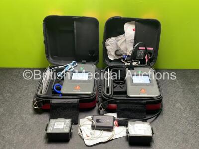 2 x Philips Heartstart FR3 Defibrillators (Both Power Up) In Carry Cases with 4 x Batteries (Install Before NA / 2023 / 2022 / 2023) and Laerdal ShockLink Box