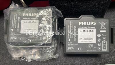 2 x Philips Heartstart FR3 Defibrillators (Both Power Up) In Carry Cases with 3 x Electrode Packs (All in Date) and 4 x Batteries (Install Before 2028 / 2028 / 2027 / 2025) - 5