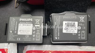 2 x Philips Heartstart FR3 Defibrillators (Both Power Up) In Carry Cases with 2 x Electrode Packs (Both in Date) and 4 x Batteries (Install Before 2028 / 2026 / 2026 / 2023) - 5