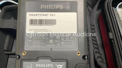 2 x Philips Heartstart FR3 Defibrillators (Both Power Up) In Carry Cases with 4 x Electrode Packs (All in Date) and 4 x Batteries (Install Before 2028 / 2028 / 2025 / 2025) - 9