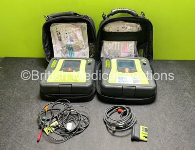 2 x Zoll AED PRO Defibrillators (Both Power Up) with 2 x 3 Lead ECG Leads, 2 x Batteries and 4 x Electrode Packs (2 x in Date, 2 x Expired)