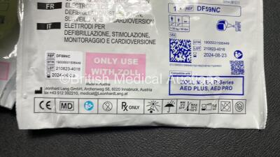 2 x Zoll AED PRO Defibrillators (Both Power Up) with 2 x 3 Lead ECG Leads, 2 x Batteries and 4 x Electrode Packs (2 x in Date, 2 x Expired) - 8