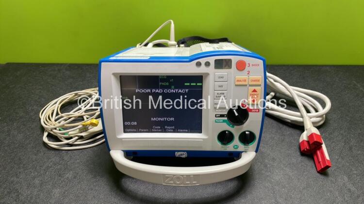 Zoll R Series ALS Defibrillator / Monitor (Powers Up) Including Pacer, ECG and Printer Options with 1 x Battery, 1 x Paddle Lead, 1 x ECG Lead and Cable Management System *AF08F005152*