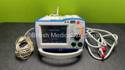 Zoll R Series ALS Defibrillator / Monitor (Powers Up) Including Pacer, ECG and Printer Options with 1 x Battery, 1 x Paddle Lead, 1 x ECG Lead and Cable Management System *AF08B003640*