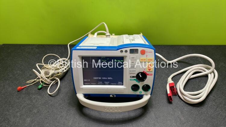 Zoll R Series ALS Defibrillator / Monitor (Powers Up) Including Pacer, ECG and Printer Options with 1 x Battery, 1 x Paddle Lead, 1 x ECG Lead and Cable Management System *AF08C004029*