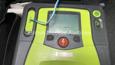 2 x Zoll AED PRO Defibrillators (Both Power Up) with 2 x 3 Lead ECG Leads, 2 x Batteries and 4 x Electrode Packs (3 x in Date, 1 x Expired) - 2