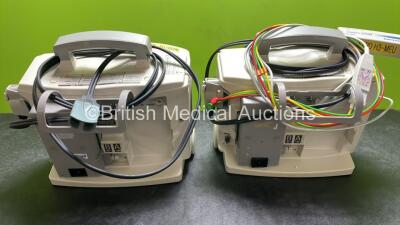 2 x Philips Heartstart MRx Defibrillators / Monitors Including ECG, and Printer Options (Both Power Up) with 1 x 3 Lead ECG Lead, 1 x Philips M3725A Test Load, 2 x Paddle Leads and 2 x Philips M3539A Modules - 7