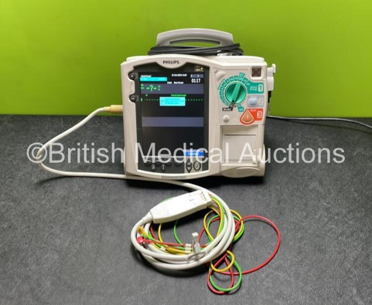 Philips Heartstart MRx Defibrillator / Monitor Including ECG, and Printer Options (Powers Up) with 1 x 3 Lead ECG Lead, 1 x Paddle Lead and 1 x Philips M3539A Module