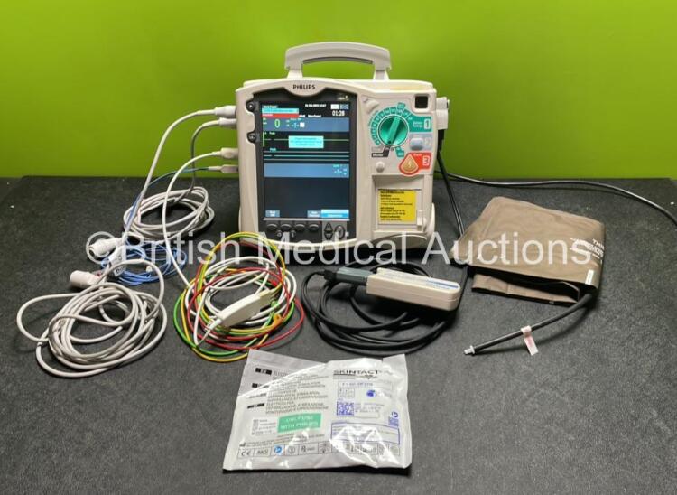 Philips Heartstart MRx Defibrillator / Monitor Including Pacer, ECG, SpO2, NIBP, BP1, BP2, Temp, CO2 and Printer Options with 1 x M3725A Test Load, 1 x Paddle Lead, 1 x Philips M3539A Module, 1 x Philips M3538A Battery, 1 x 3 Lead ECG Lead, 1 x SpO2 Finge