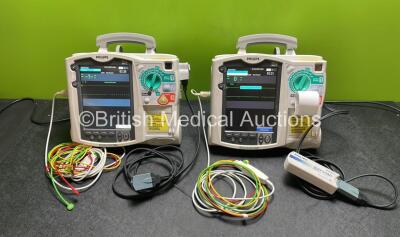 Job Lot Including 1 x Philips Heartstart MRx Defibrillator / Monitor Including Pacer, ECG and Printer Options 1 x Philips Heartstart MRx Defibrillator / Monitor Including ECG and Printer Options with 1 x M3725A Test Load, 2 x Paddle Leads, 2 x Philips M35