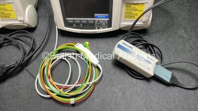 Job Lot Including 1 x Philips Heartstart MRx Defibrillator / Monitor Including Pacer, ECG and Printer Options 1 x Philips Heartstart MRx Defibrillator / Monitor Including ECG and Printer Options with 1 x M3725A Test Load, 2 x Paddle Leads, 2 x Philips M35 - 4