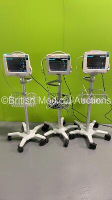 3 x Philips IntelliVue MP50 Patient Monitors on Stands with 3 x M3001A Multiparameter Modules with NBP, SPO2 and ECG/Resp Options and Selection of Cables (All Power Up)