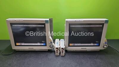 2 x Philips IntelliVue MP70 Patient Monitors (Both Power Up, 1 x Missing Dial) with 2 x Philips M3001A Modules Including ECG, SpO2, NBP, Press and Temp Options *SN DE632G1242 / DE717P7396 / DE61750389 / DE61750384*